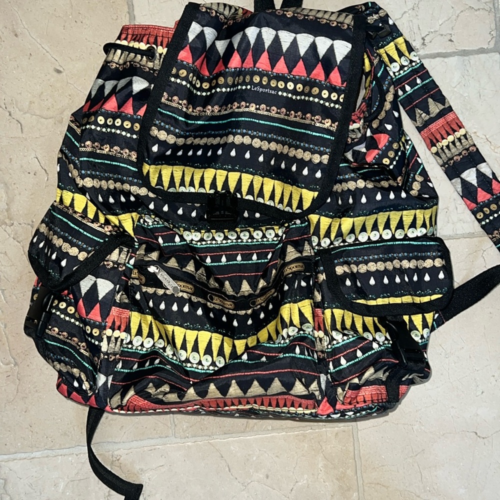 Le Sportsac Voyager Backpack. Coffee stain inside mesh. No holes, Zippers work.